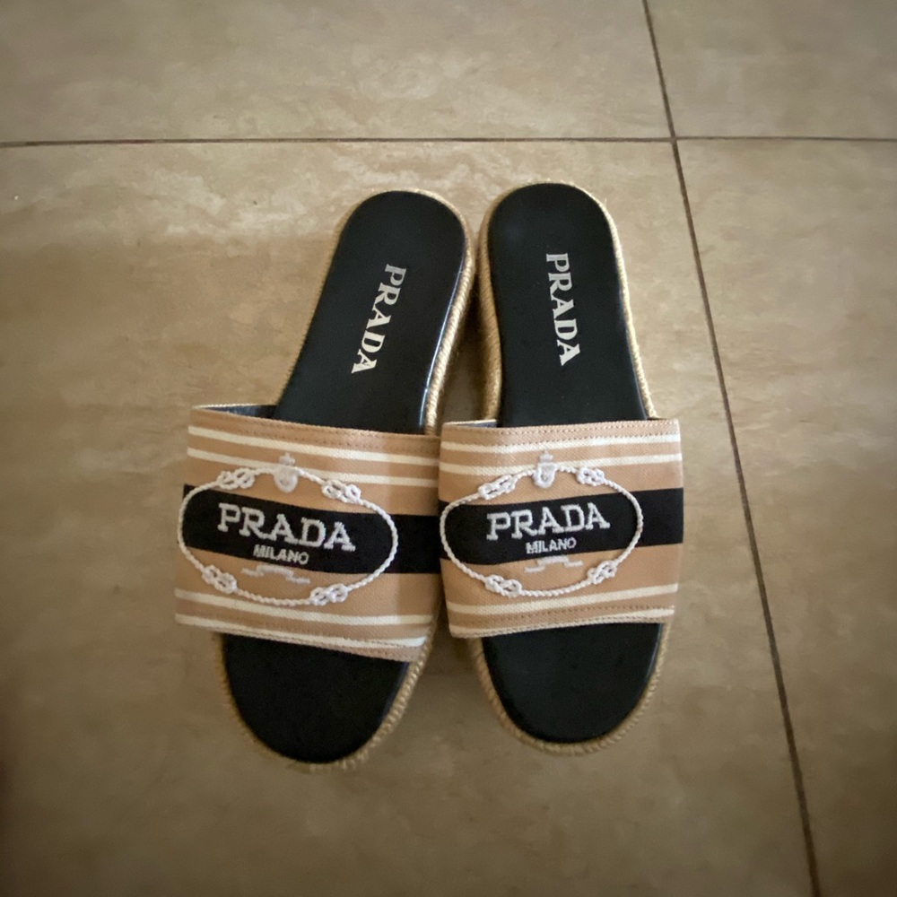 Prada slides.